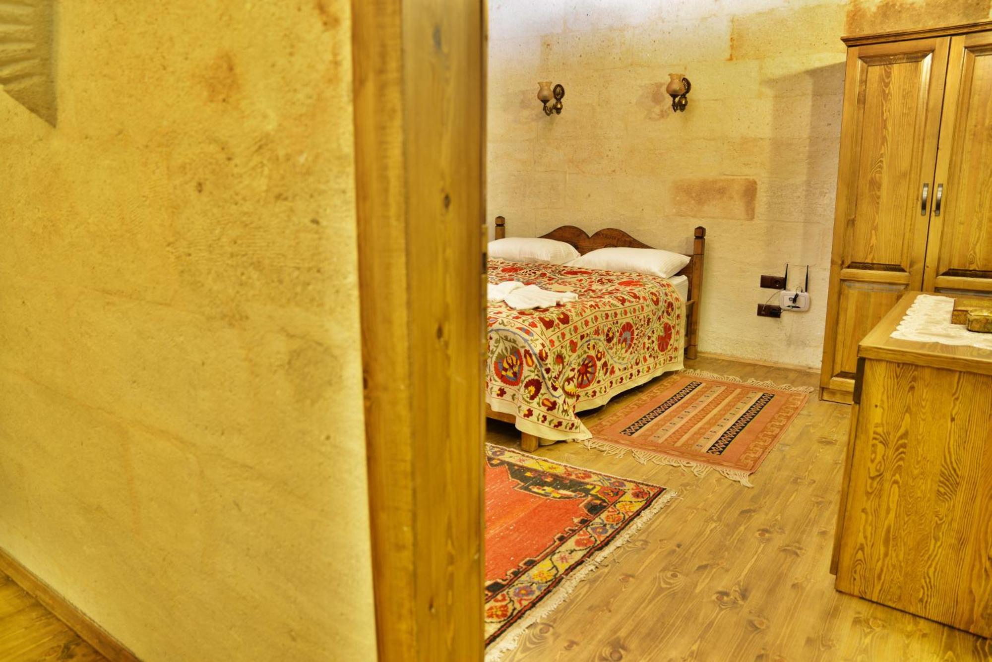Uerguep Inn Cave Hotel Номер фото