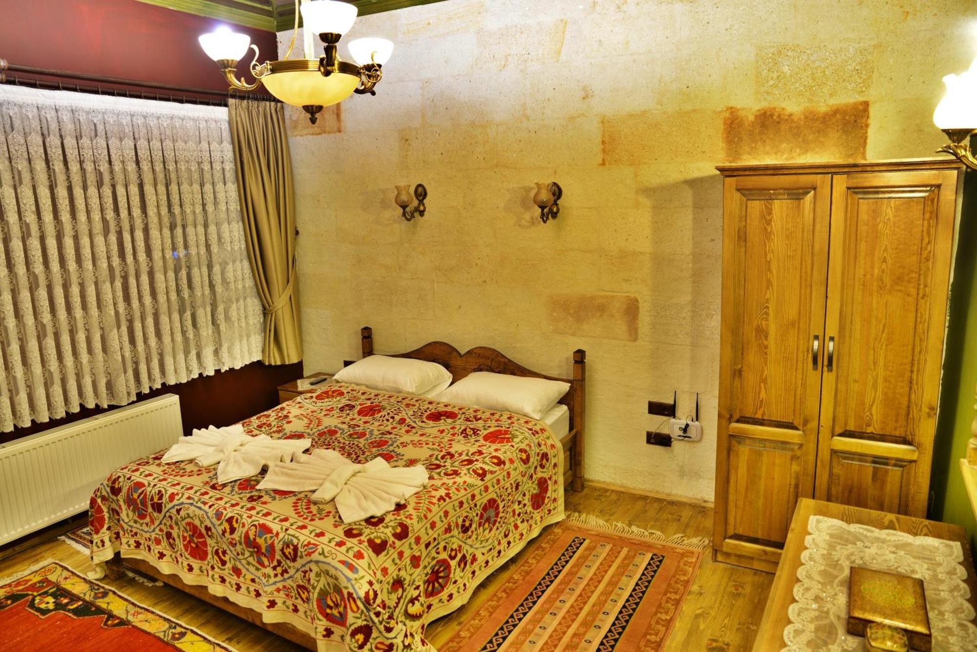 Uerguep Inn Cave Hotel Номер фото